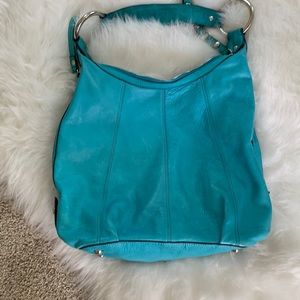 B. MAkowsky Turquoise leather handbag